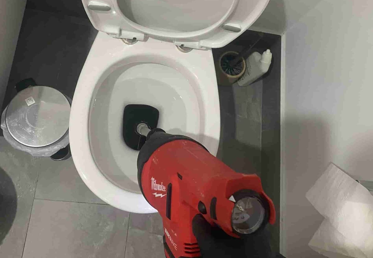 Air snake clearing a blocked toilet on a Tap Tech job in Perth